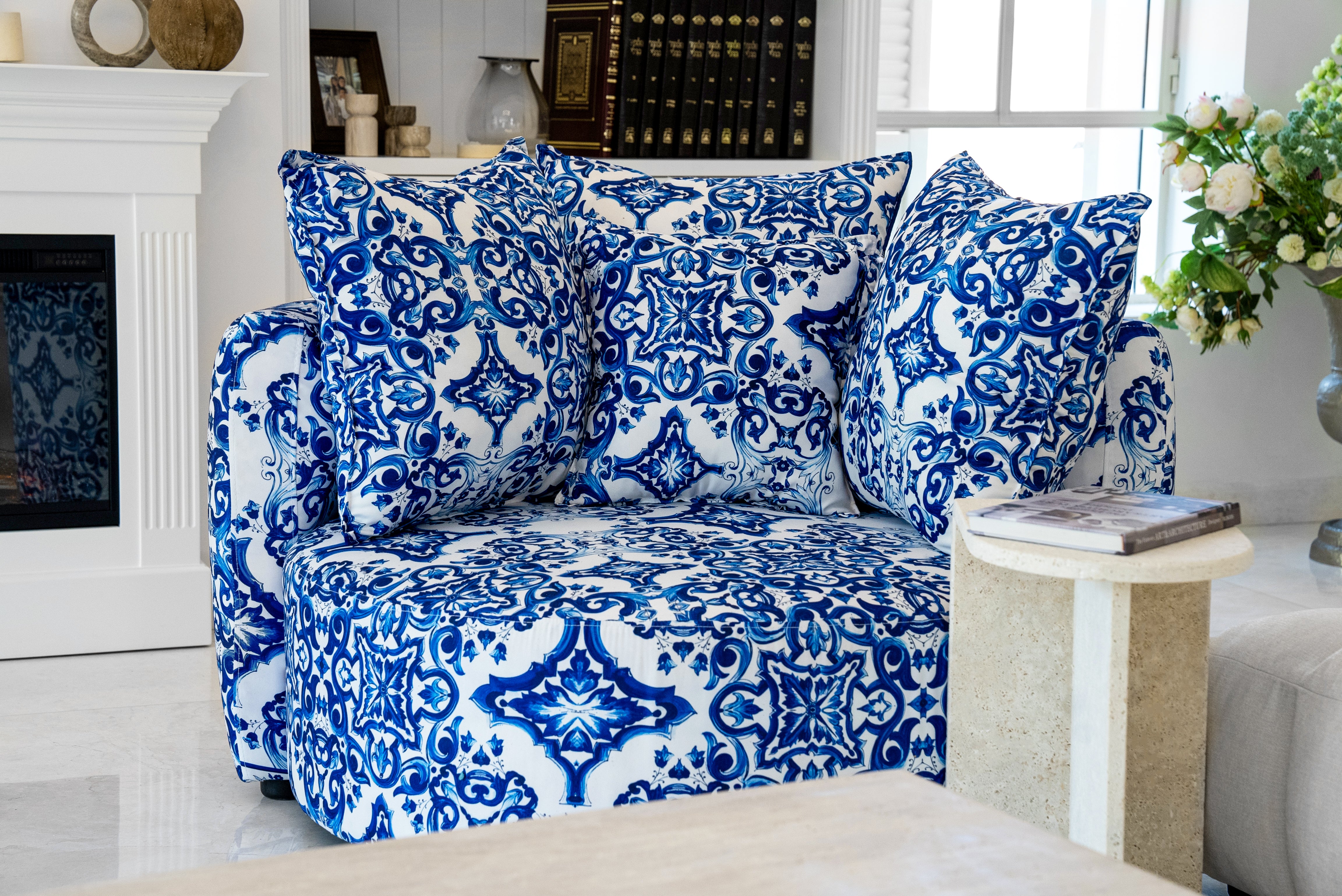 Title: "Azul French-Inspired Swivel Accent Chair: Elegant Blue and White Pattern:
"Elevate your living space with the Azul French-inspired swivel accent chair. Featuring a stunning this elegant armchair combines comfort and style. The curved silhouette and plush cushions create a cozy seating option, while the bold print adds a pop of color to any room. Perfect for contemporary or traditional interiors, this statement piece complements white built-ins and pairs beautifully with natural elements like wooden