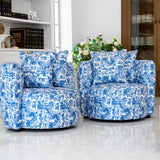 "Blue Towel armchair featuring a vibrant blue and white floral print upholstery. This barrel-style chair has a rounded back, plush seat cushion, and comes with two matching throw pillows, offering a striking accent piece for refined home decor."