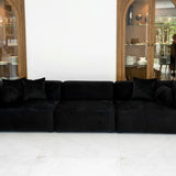 "NOIR sofa featuring luxurious black velvet upholstery, modular design with three sections, and plush cushions. Sleek modern couch set against wooden display cabinets in a bright, contemporary living space." CopyRetryDMתרגם לעבריתEditכותרת המוצר:
"ספת NOIR - ספה מודולרית אלגנטית מקטיפה שחורה לסלון מודרני"
טקסט ALT:
"ספת NOIR המציגה ריפוד קטיפה שחורה יוקרתית, עיצוב מודולרי עם שלושה חלקים, וכריות רכות ומפנקות. ספה מודרנית מסוגננת על רקע ארונות תצוגה מעץ בחלל מגורים בהיר ועכשווי." CopyRetryDMכמומחה SEO תן כותר