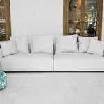Le Nuage Blanc - elegant white modular sofa with plush cushions and clean lines, perfect for contemporary interiors"