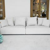 Le Nuage Blanc - elegant white modular sofa with plush cushions and clean lines, perfect for contemporary interiors"