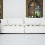 PURE sofa in pure white, modern and clean design with wide seats and soft back cushions. High-quality modular sofa suitable for a stylish living room.