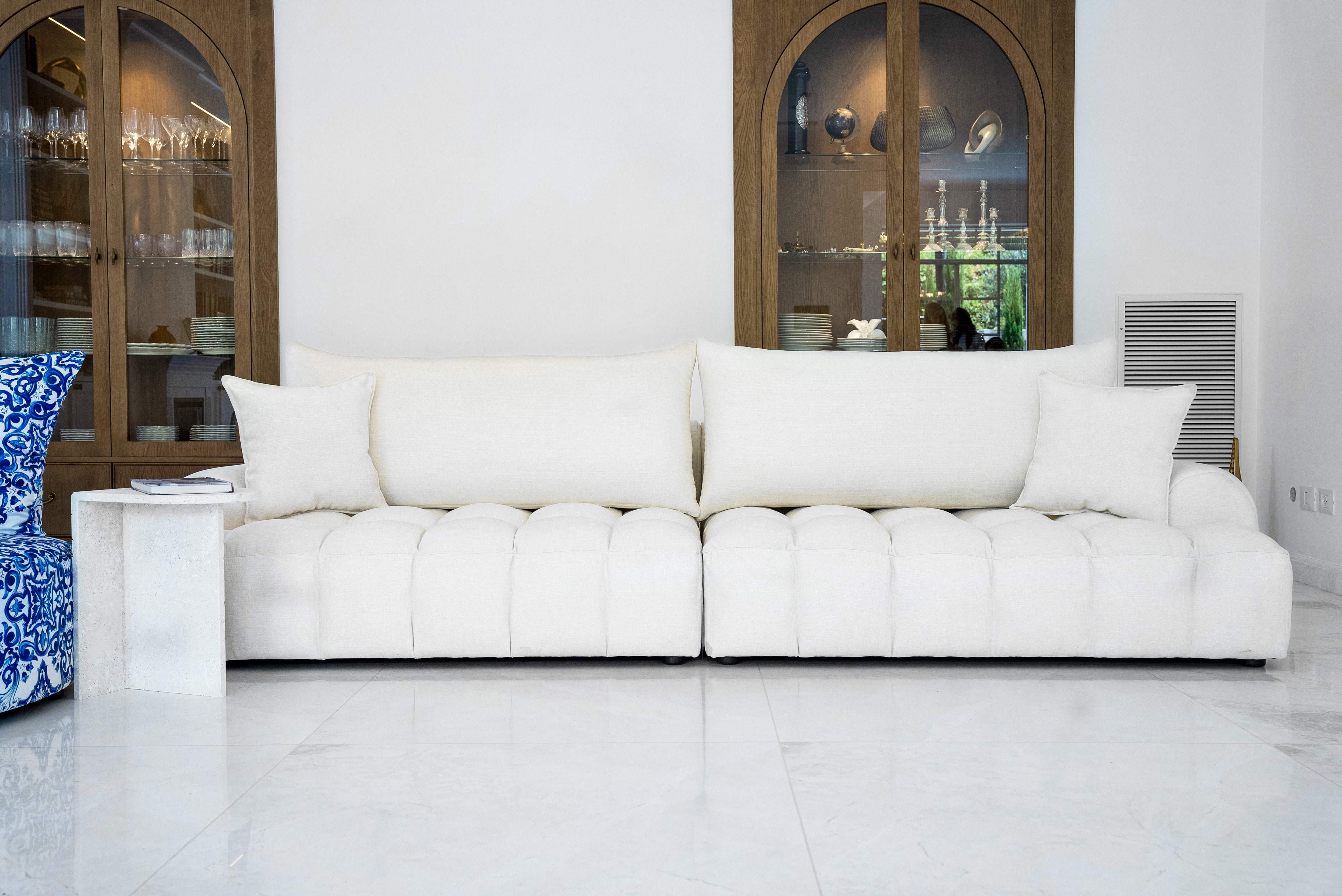 PURE sofa in pure white, modern and clean design with wide seats and soft back cushions. High-quality modular sofa suitable for a stylish living room.